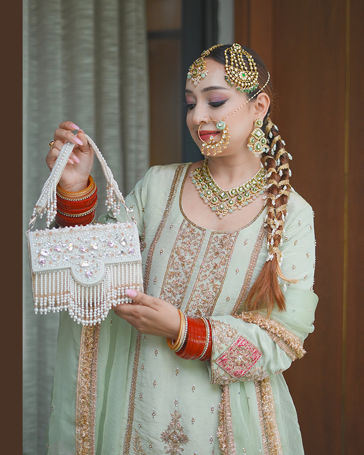 Pearl Grace Embellished Tassel Clutch