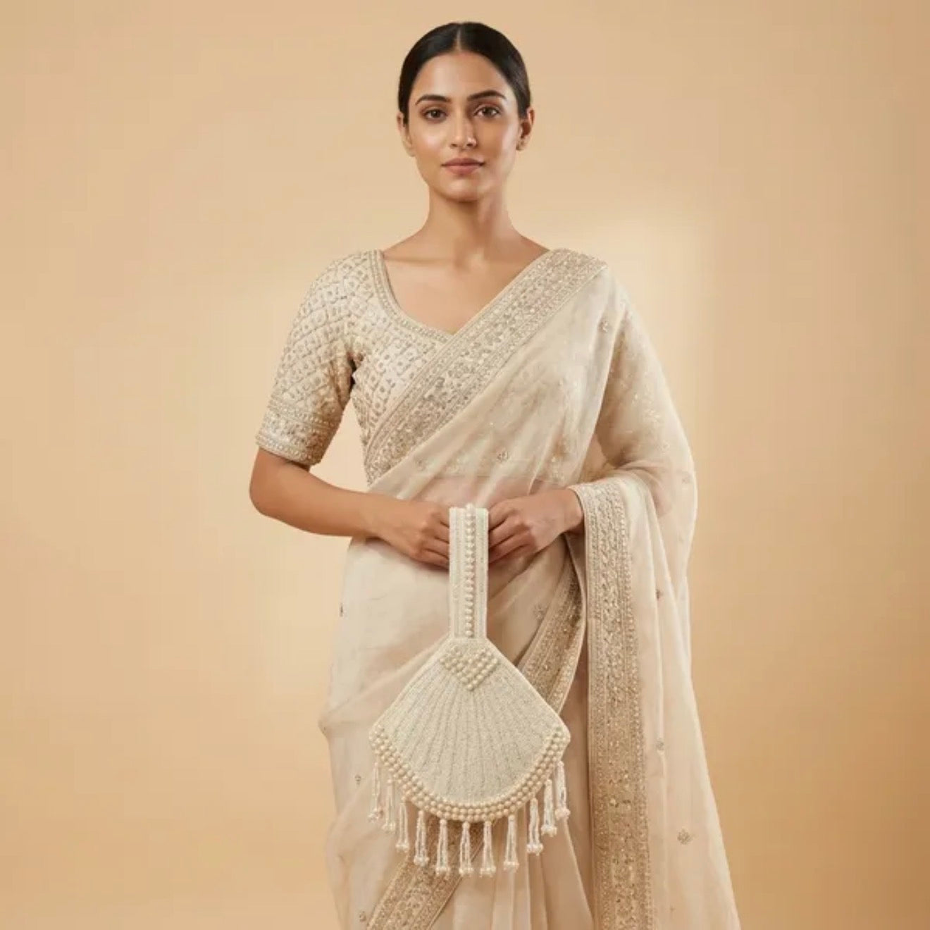 TRIA WhiteGrace Tassel Potli