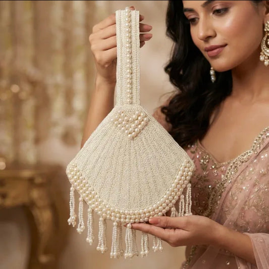 TRIA WhiteGrace Tassel Potli